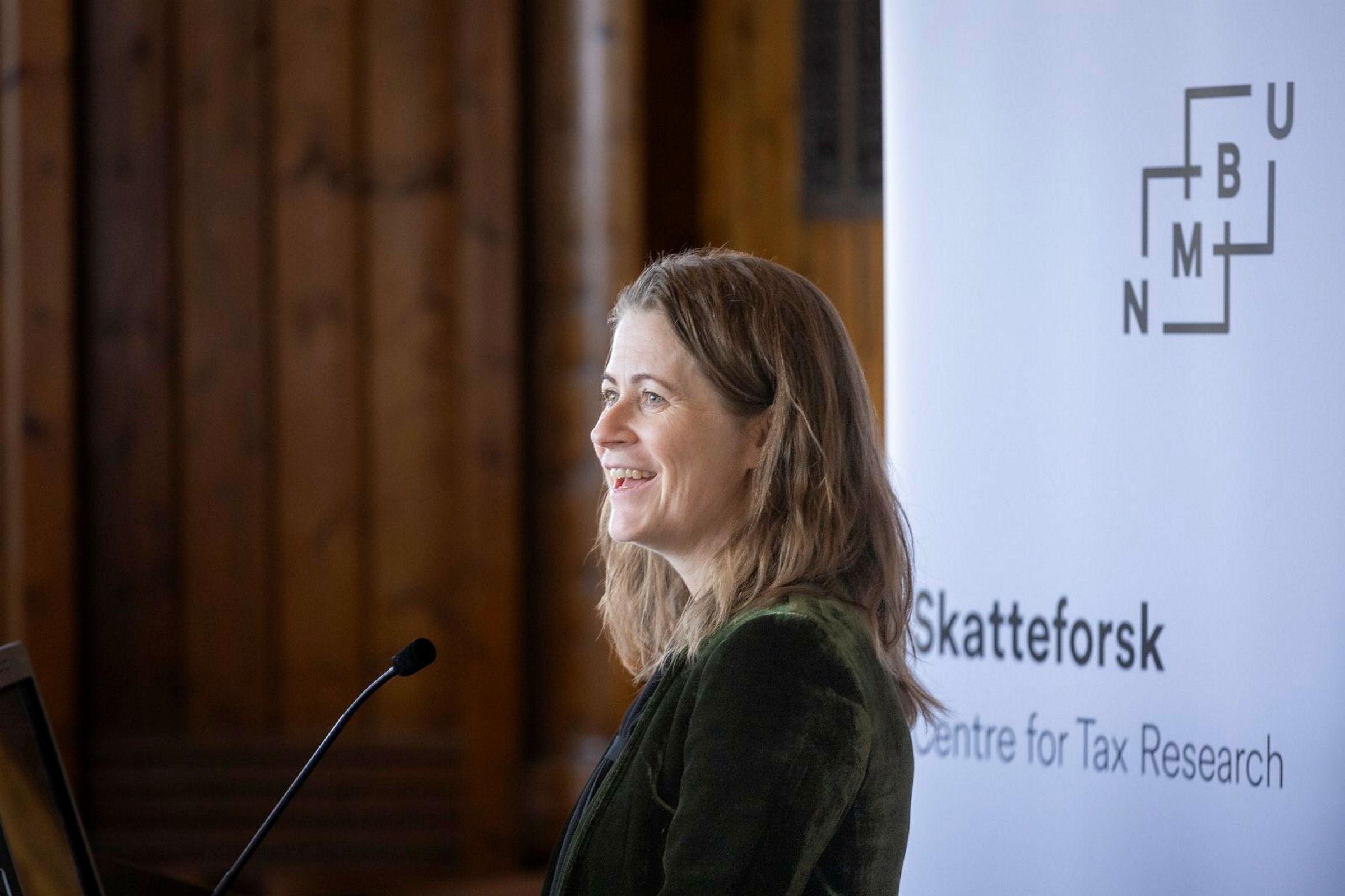 Professor Annette Alstadsæter under åpningen av
Skatteforsk 28.03.2023.